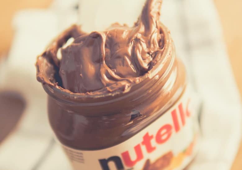 a close up shot of a jar of nutella