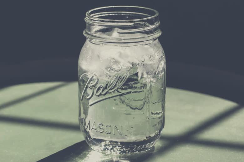 A bright picture of an empty mason jar