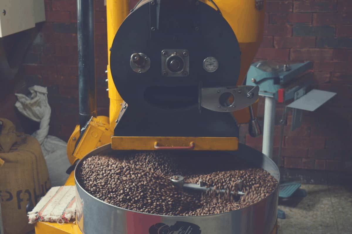 A wide shot of a coffee roasting machine