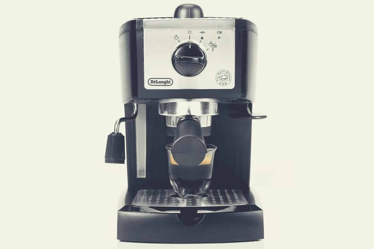 A wide shot of the Delonghi EC155 espresso, cappuccino and latte machine