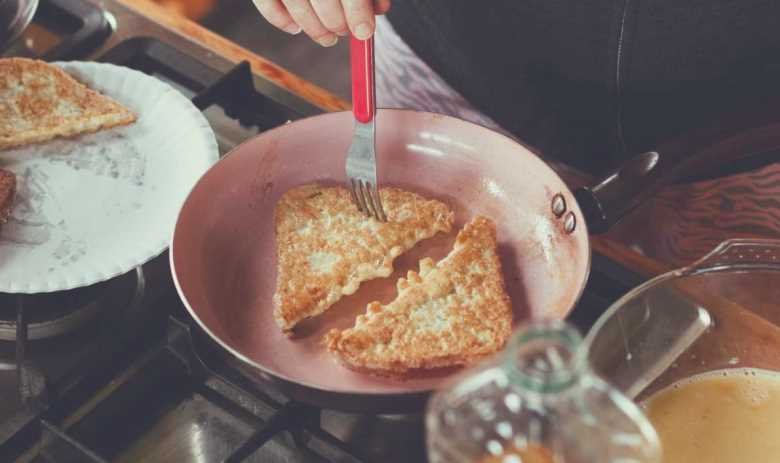 French toast being fried in a French skillet