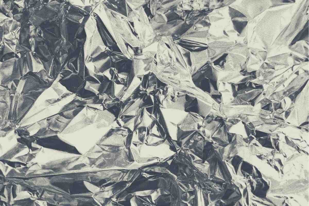 A top down view of wrinkled aluminum foil