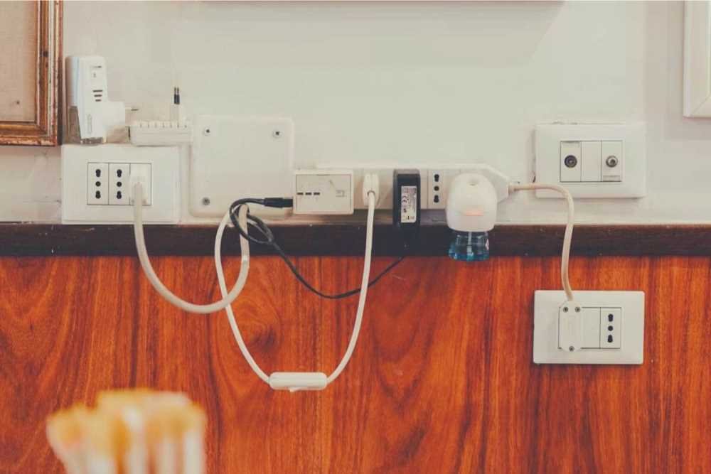 A number of different appliances plugged into a selection of power outlets