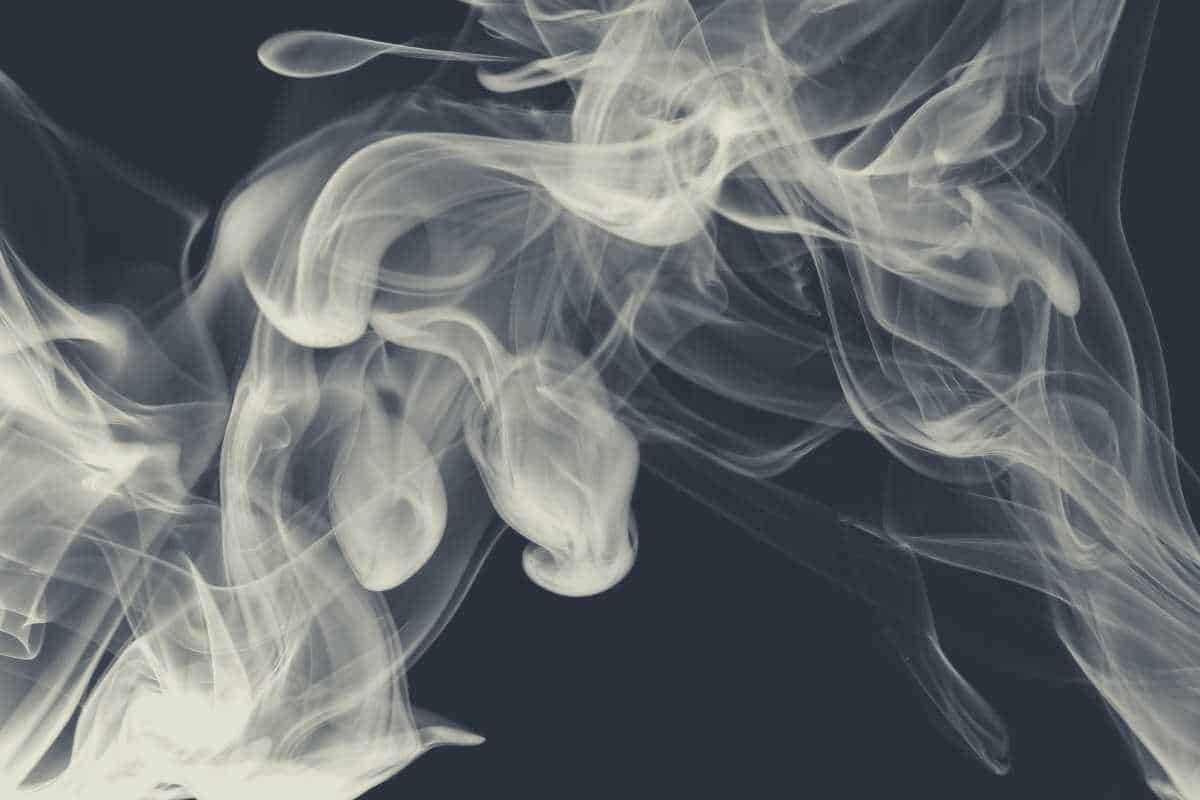 White smoke against a black background