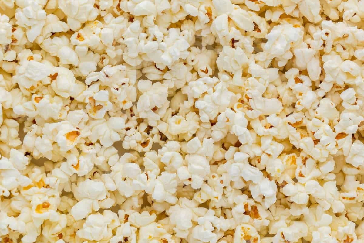 A close up shot of a big pile of popcorn.